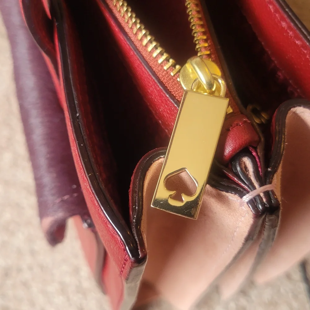 Kate Spade elegant burgundy and purple handbag